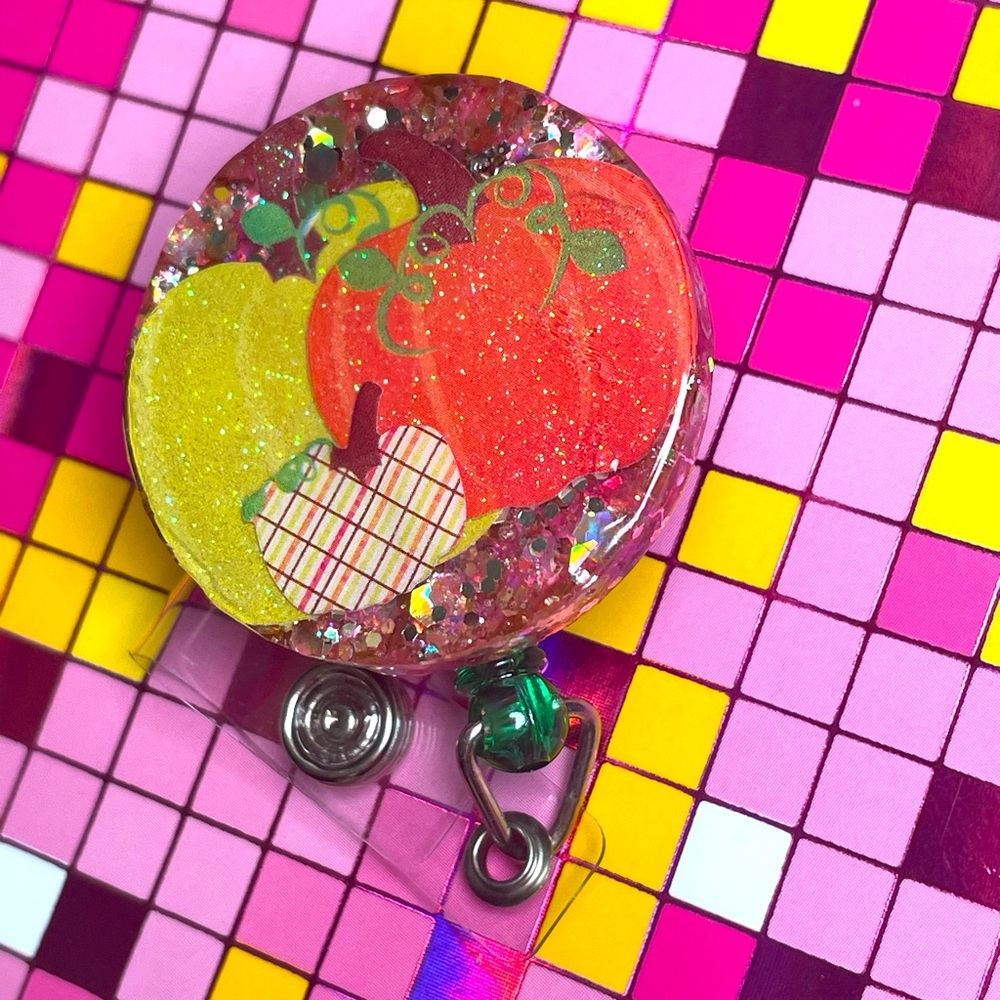 Pumpkins and glitter badge reel